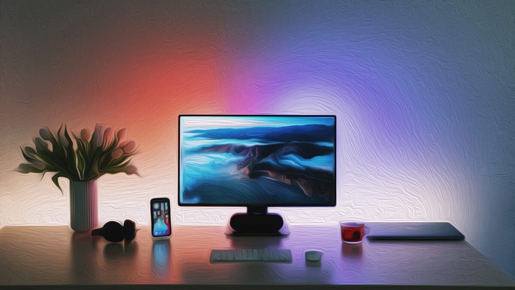Ilustrație cu un birou cu lumini RGB și un monitor în centrul biroului